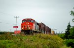 CN 9576 leads 561 past Matane sign